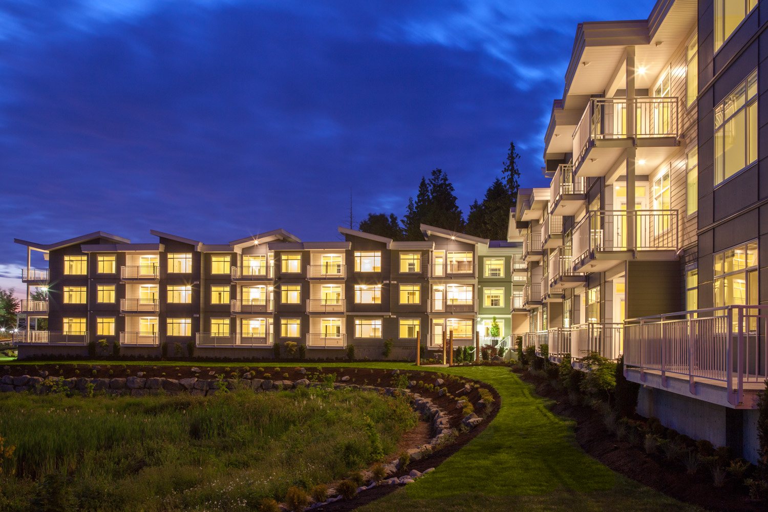 Songbird multi-residential building at dusk