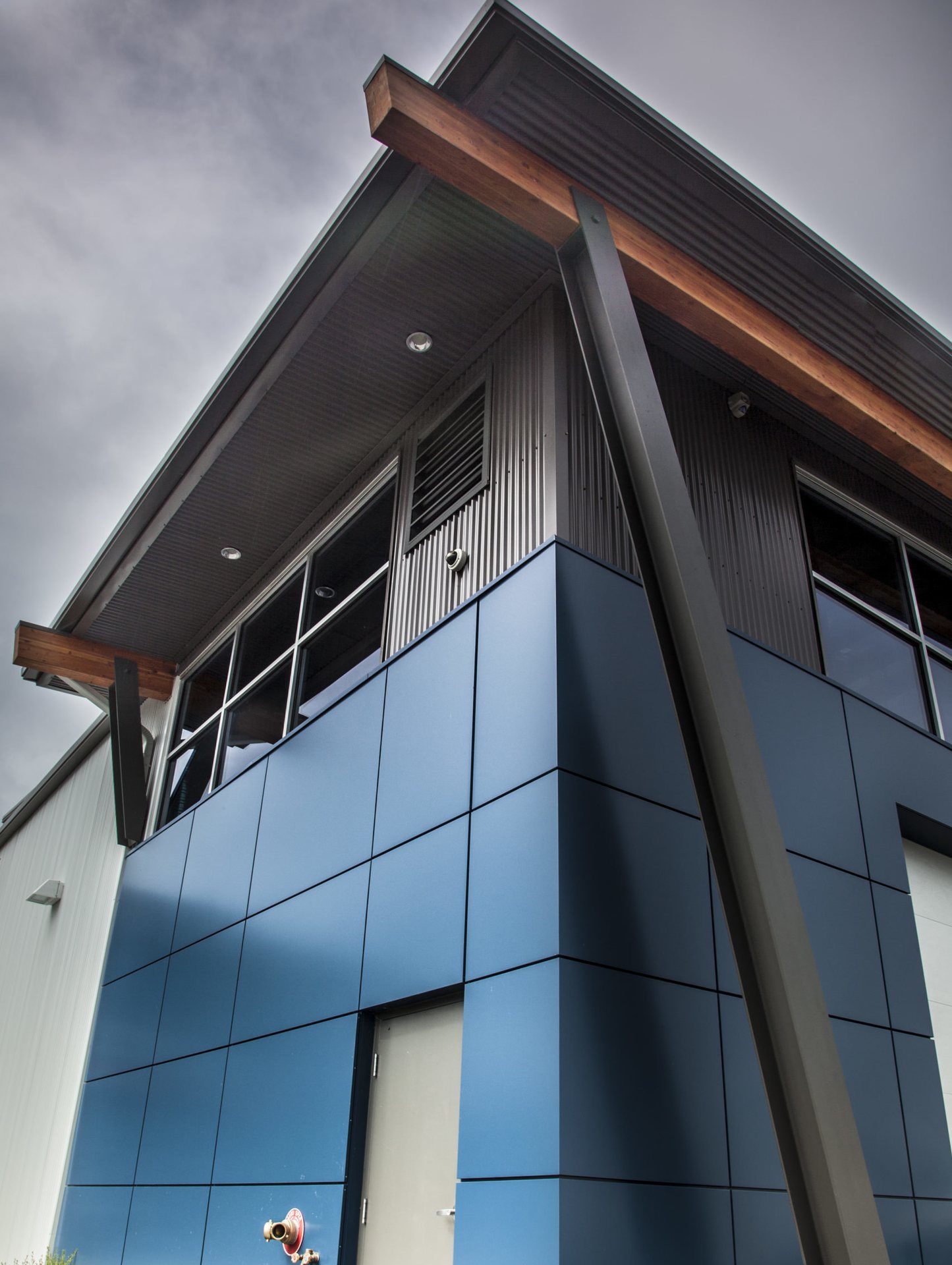 Commercial building corner with timber and metal cladding