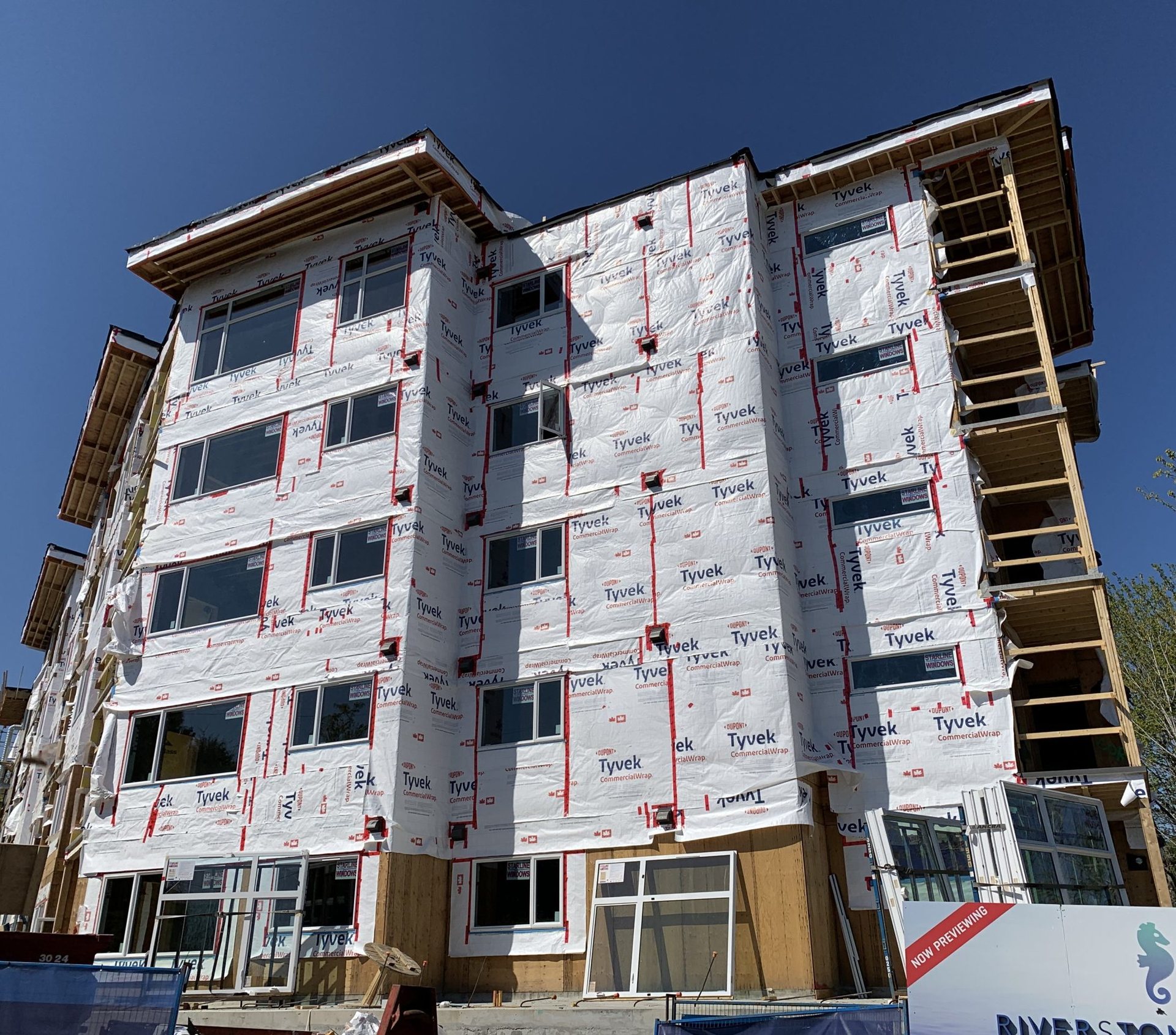 Building enclosure work on a multi-storey building